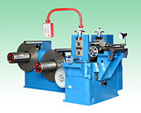 Slitting machine for producing -strap clips-